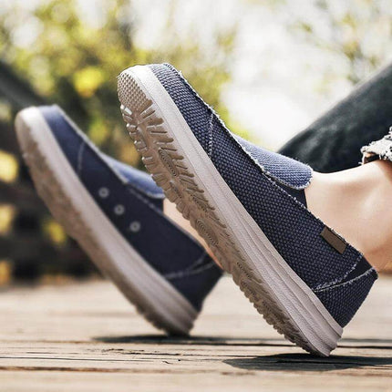 Zapatos informales para hombre, lona azul, transpirables y cómodos, ideales para el día a día y actividades casuales.