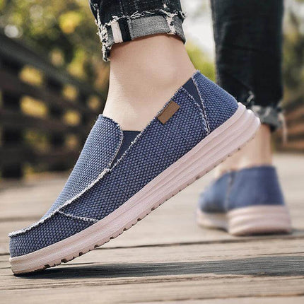 Zapatos informales transpirables de lona azul para hombre, ideales para un look relajado y cómodo.