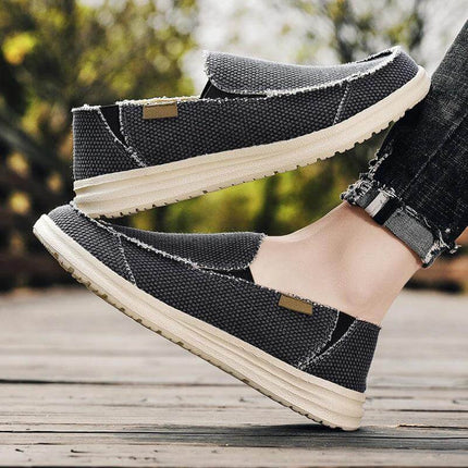Zapatos informales de lona gris oscuro, transpirables y cómodos para hombres, ideales para uso casual.