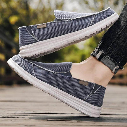 Zapatos informales de lona azul, transpirables, para hombres. Estilo casual, ideales para uso diario y comodidad.