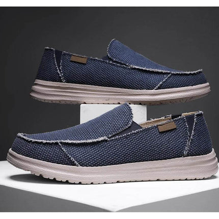 Zapatos informales de lona transpirables color azul marino para hombre, diseño moderno con suela cómoda.